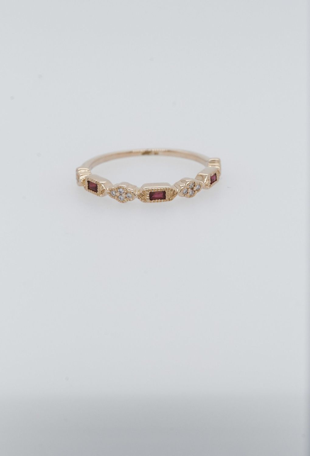 AVI-14KY 1.40g .06ctw Diamond .15ctw Ruby Stackable Band (size 6.5)