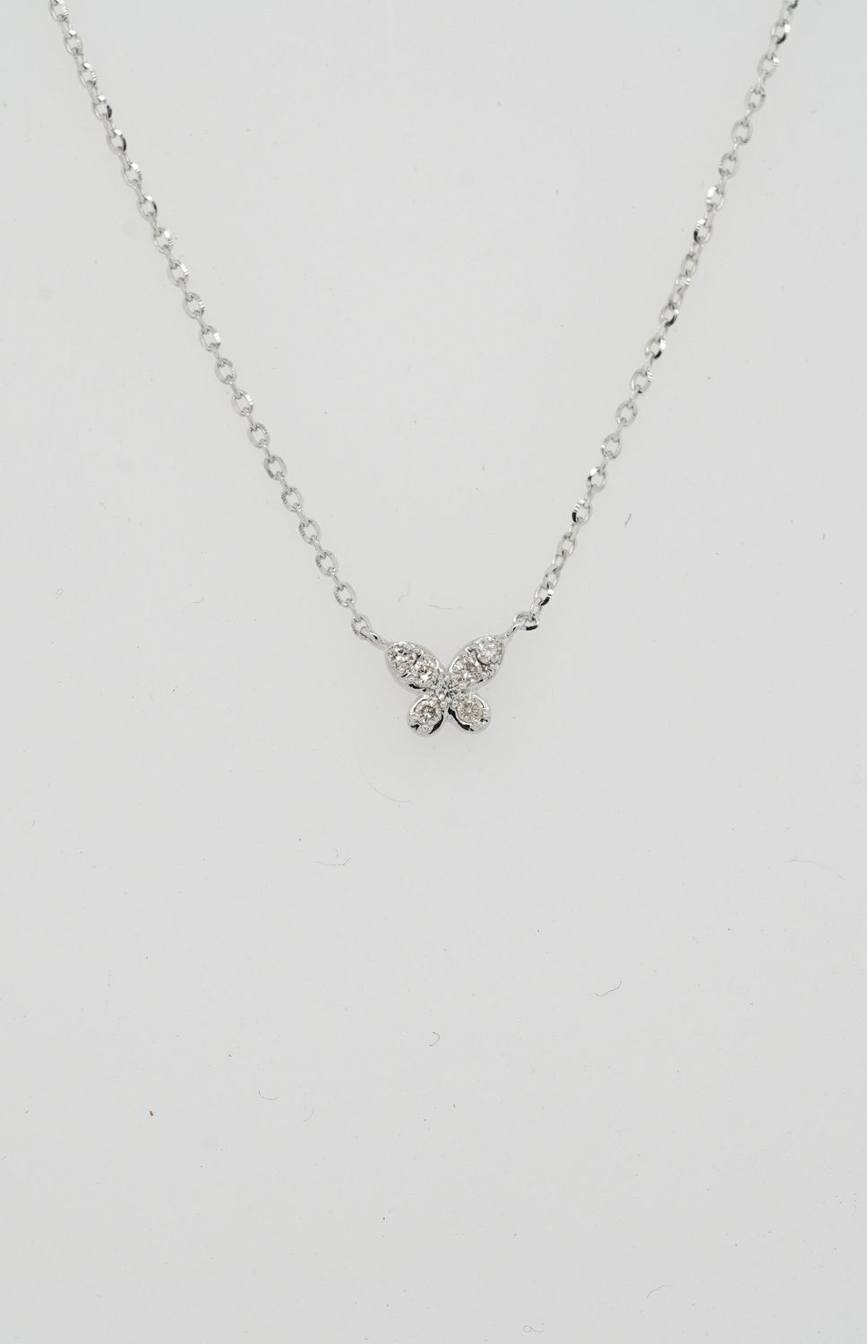 VDE- 14KW 1.35g .06ctw Diamond Butterfly Pendant 16-18&quot;