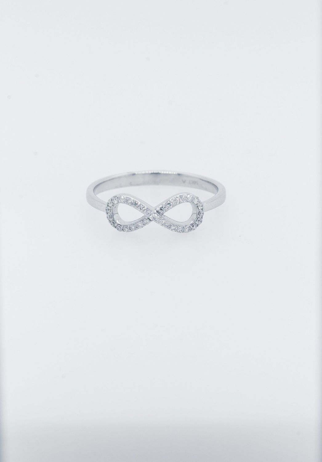 ATT- 14KW .18ctw Diamond Infinity Fashion Ring (size 7)