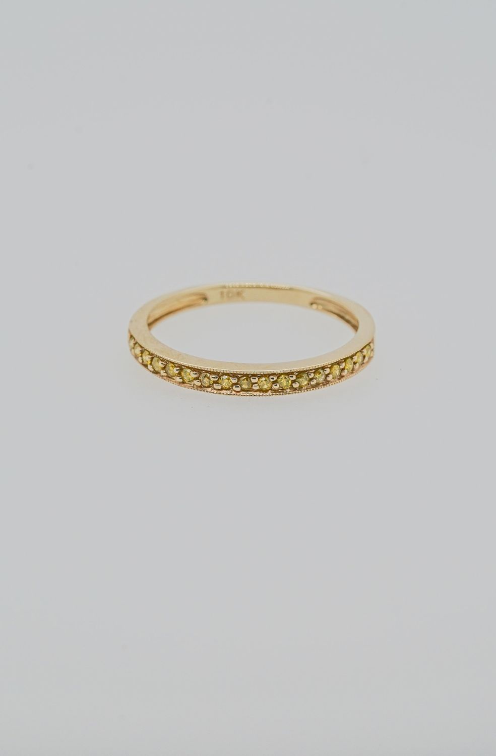 VET- 10KY 1.4g .13ctw Yellow Diamond Stackable Band (size 7)