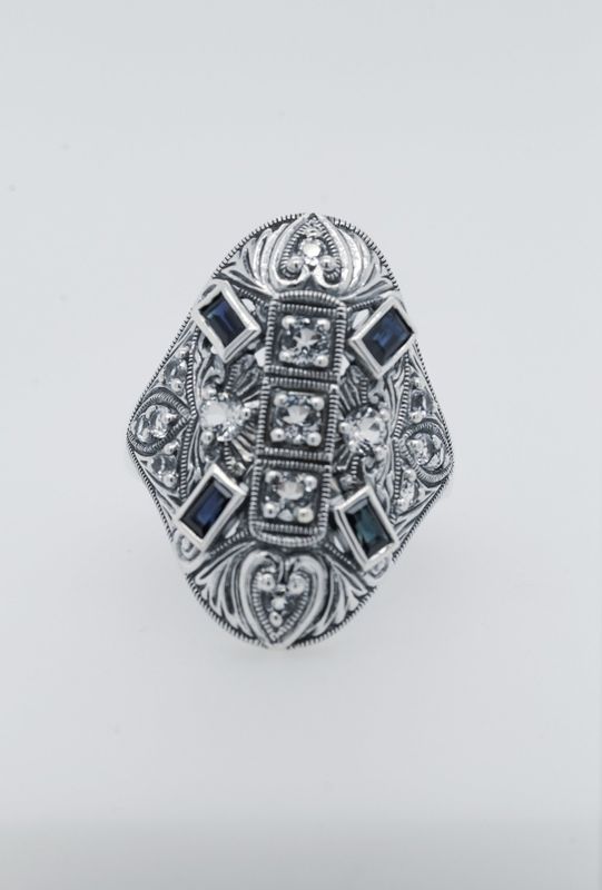 ERX- Sterling 9.49g Sapphire &amp; Topaz Trufili Ring (size 8)