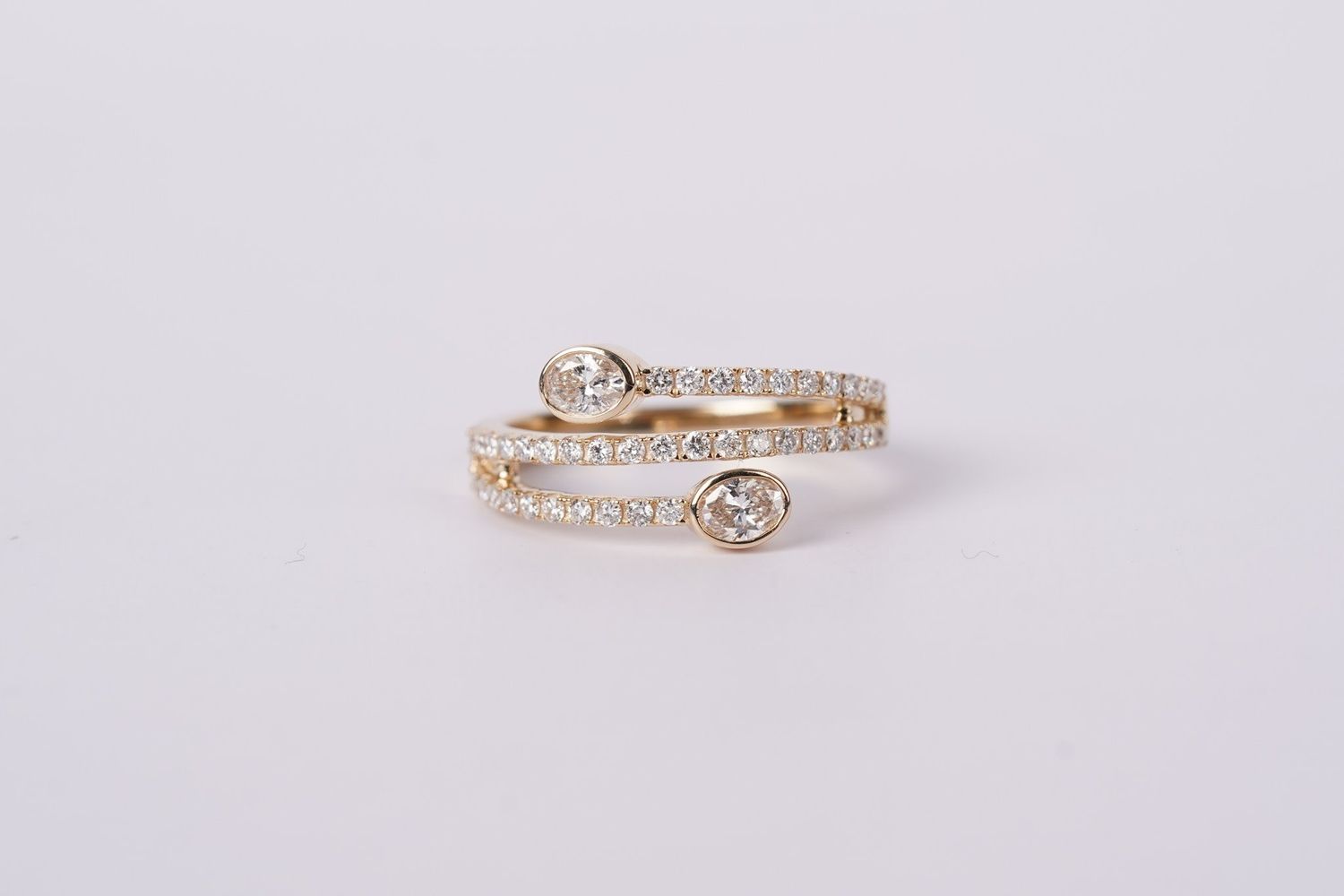 LVRX- 14KY 2.9g .75ctw Oval Diamond Bypass Fashion Ring (size 7)