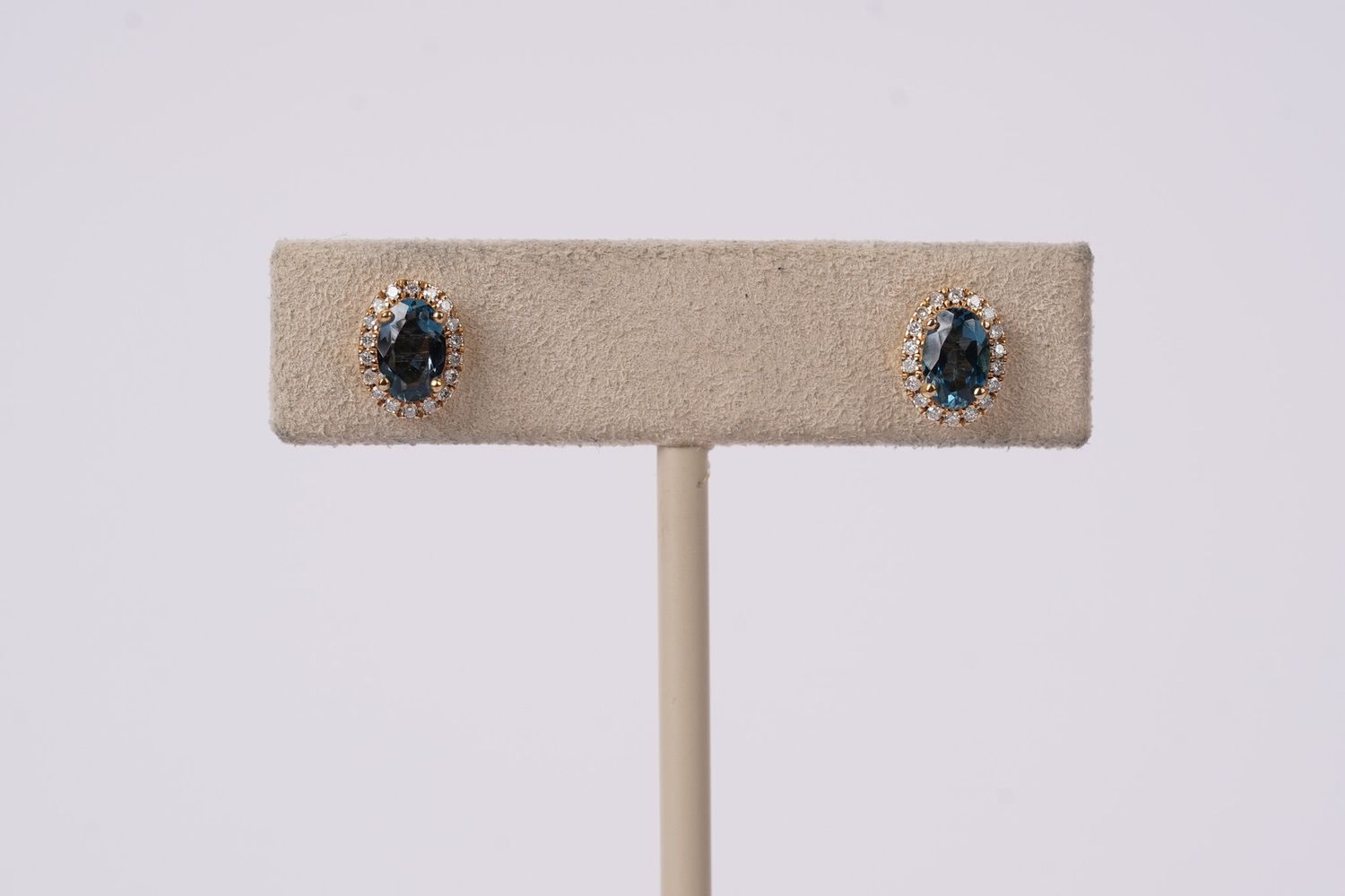 VDE- 14KY 1.13g 1.00ctw London Blue Topaz .15ctw Diamond Halo Fashion Earrings