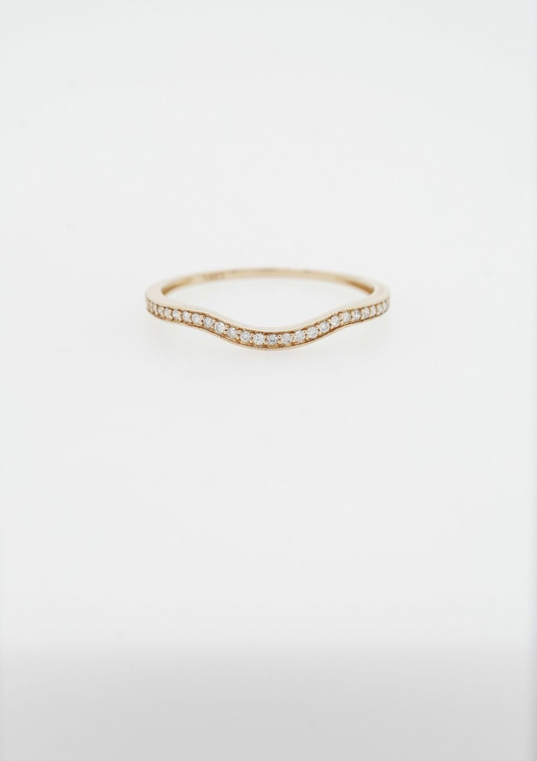 VDI- 14KY .90g .14ctw Diamond Stackable Curved Band (size 7)