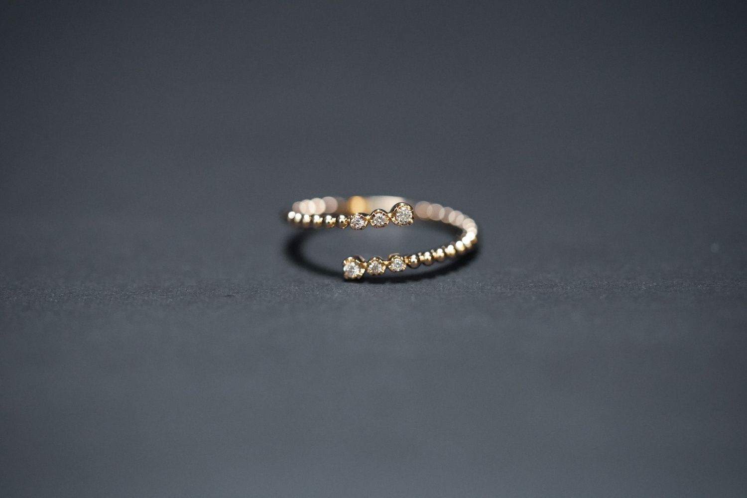 AVEX- 14KY 2.05g .09ctw Diamond Bypass Ring (size 7)