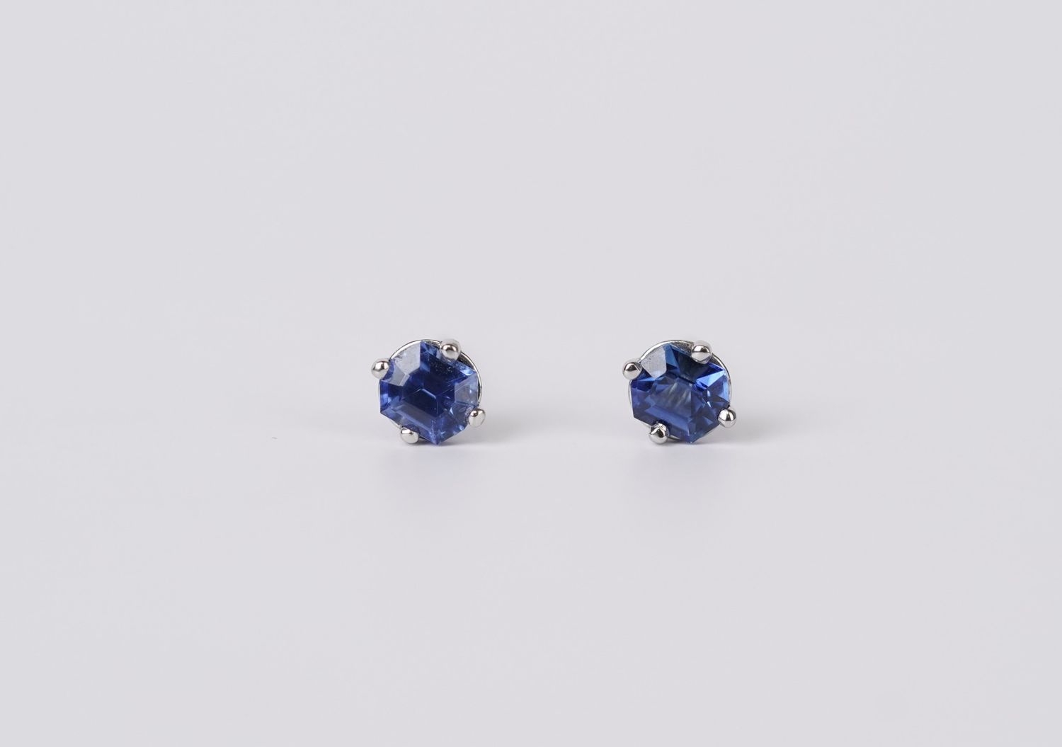 NETX- 14KW .78g .63ctw Sapphire Hexagon Cut Stud Earrings