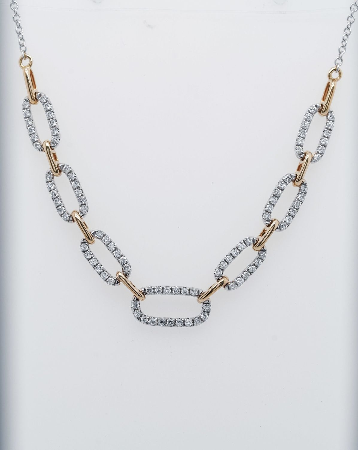 BTT- 18KWY 3.95g .43ctw Diamond Oval Link Pendant 16-18&quot;