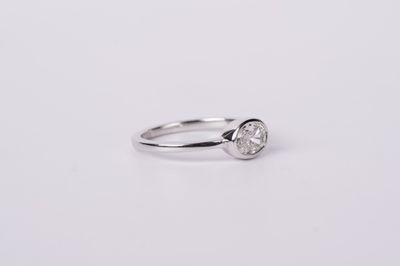 LTTX- 14KW 2.78g .59ct F/SI1 Oval Diamond Bezel Ring (size 7)
