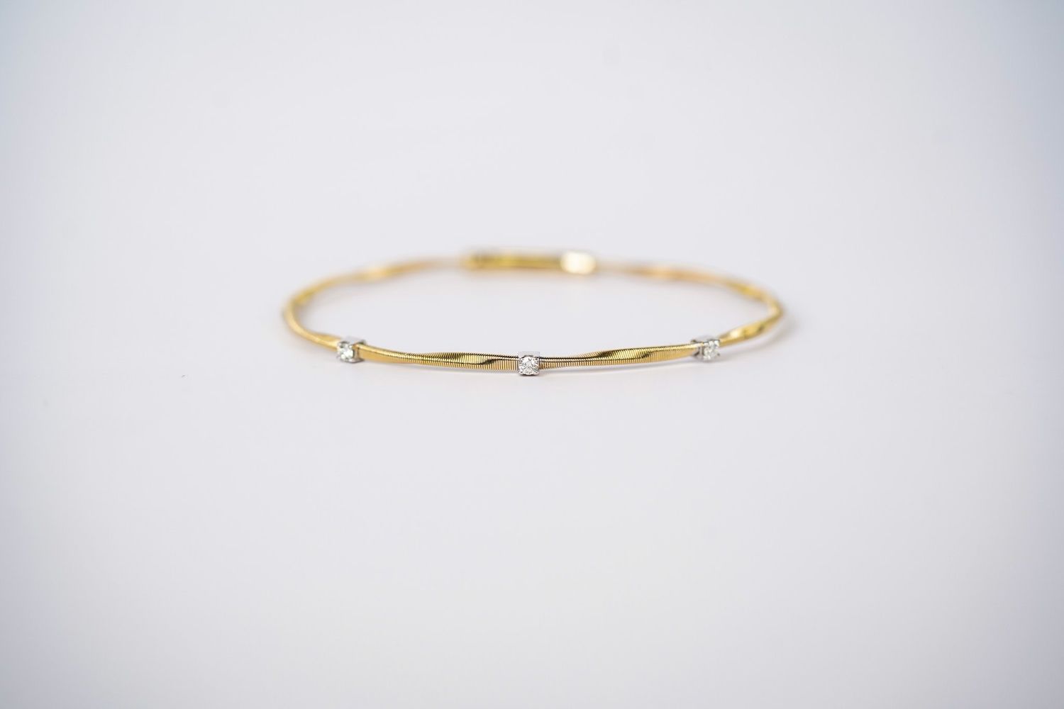 ERIX- 14KWY 4.73g .14ctw Diamond Flex Bangle