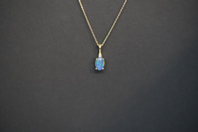 VIT- 14KY 2.84g .77ctw Blue Opal &amp; Diamond Pendant 16-18&quot;