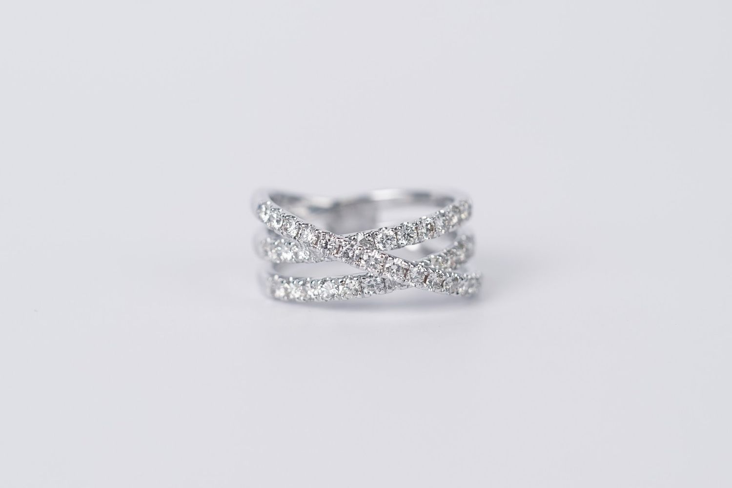 IDIX- 14KW 4.21g 1.28ctw Diamond Crossover Fashion Ring (size 7.5)