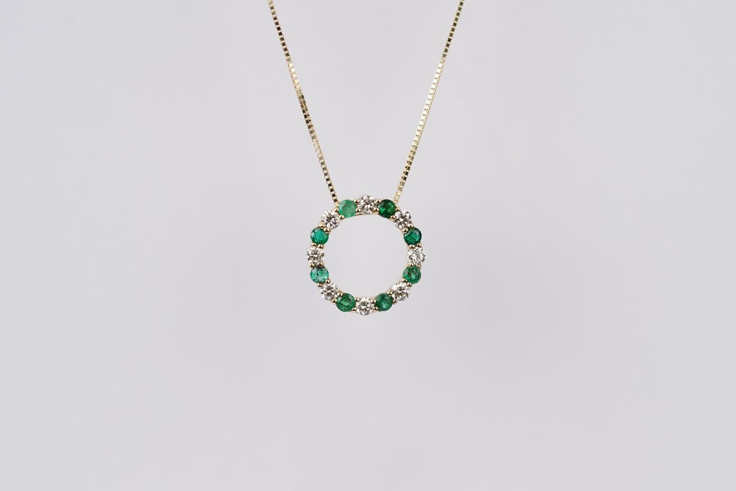 AETX- 14KY 2.20g .52ctw Emerald &amp; Diamond  Circle Pendant 18&quot;