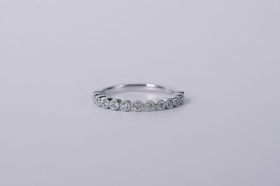 NTT- 14KW 2.3g .20ctw Diamond Milgrain Bezel Stackable Band (size 7)