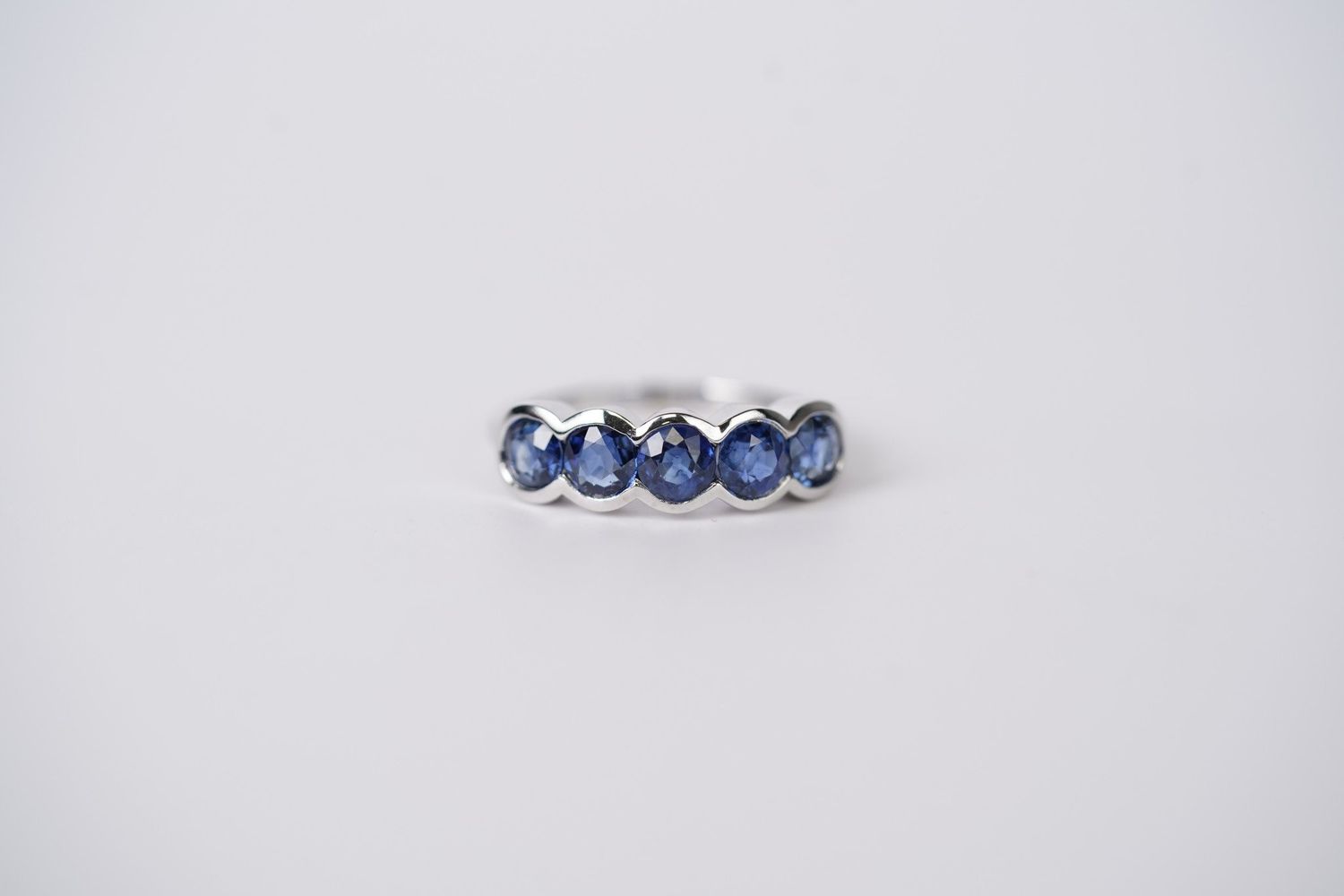 LNEX- 14KW 3.93g 2.52ctw Blue Sapphire Half Bezel Stackable Band (size 7)