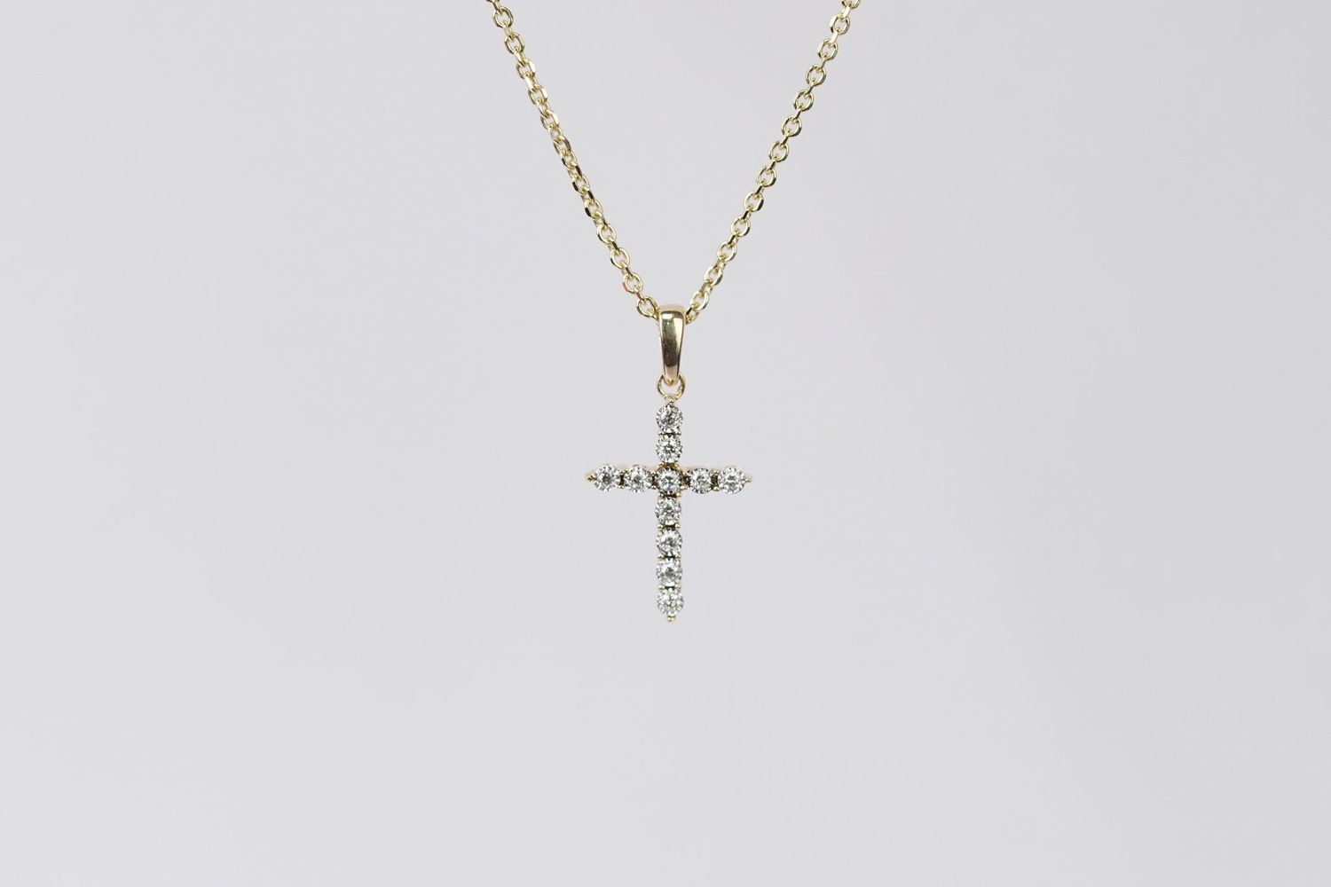 ATD- 14KY 2.31g .08ctw Diamond Cross Pendant 16-18&quot;