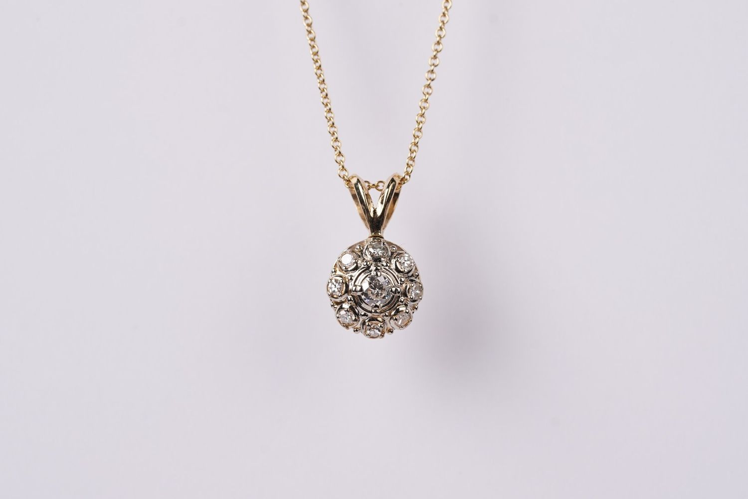ATTX- 14KY 3.20g .20ctw Diamond Halo Pendant 16-18&quot;