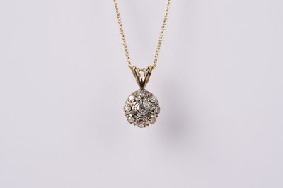ATTX- 14KY 3.20g .20ctw Diamond Halo Pendant 16-18&quot;