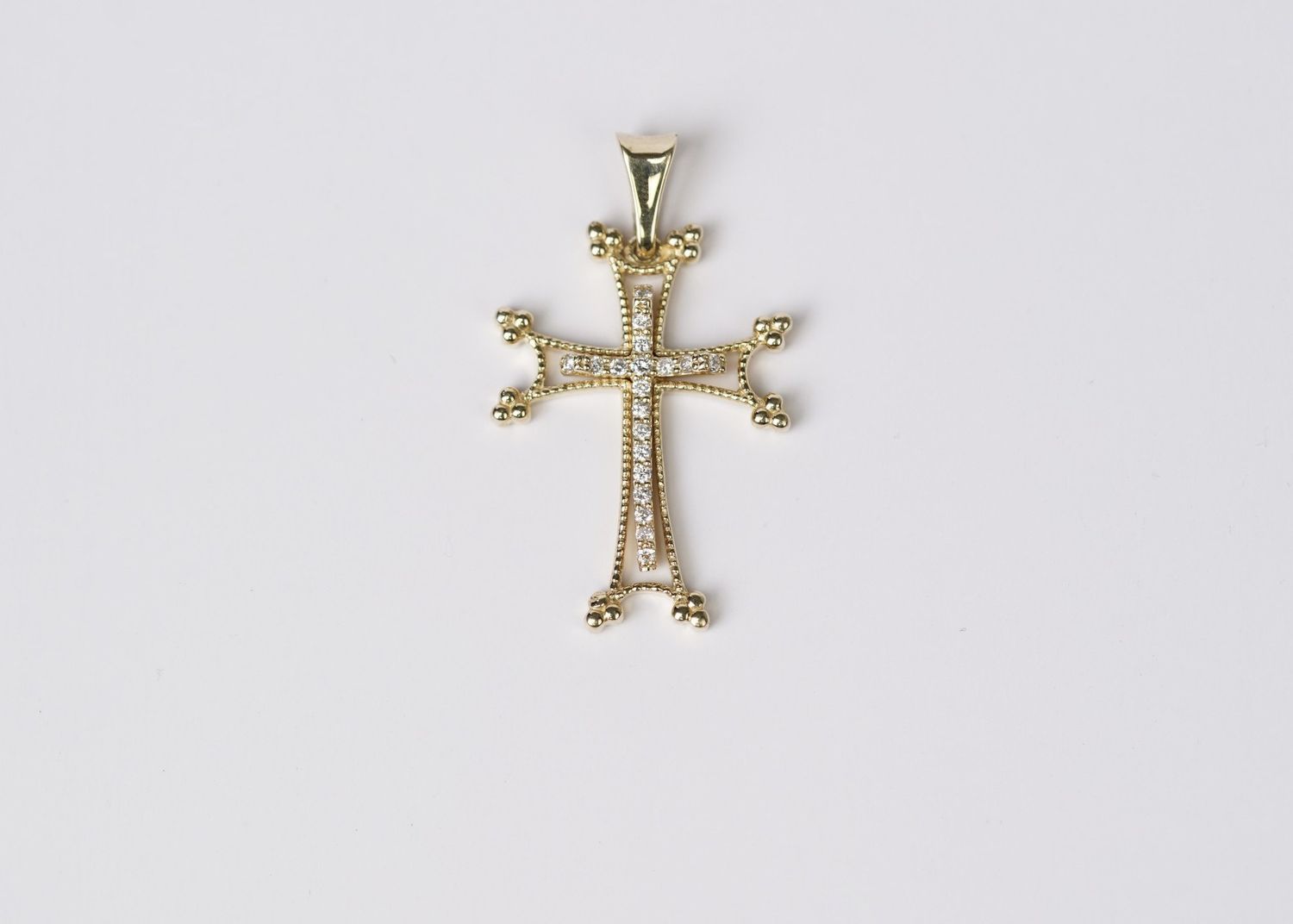 ABEX- 14KY 4.20g .20ctw Diamond Cross (charm only)