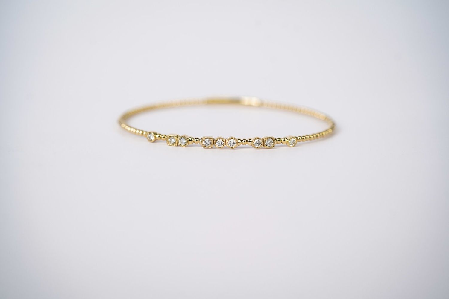 RTTX- 14KY 5.52g .45ctw Diamond Flex Bangle