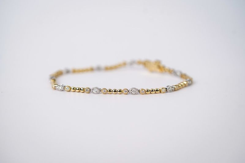 LTTX- 14KWY 7.09g .69ctw Diamond Fashion Tennis Bracelet 7&quot;