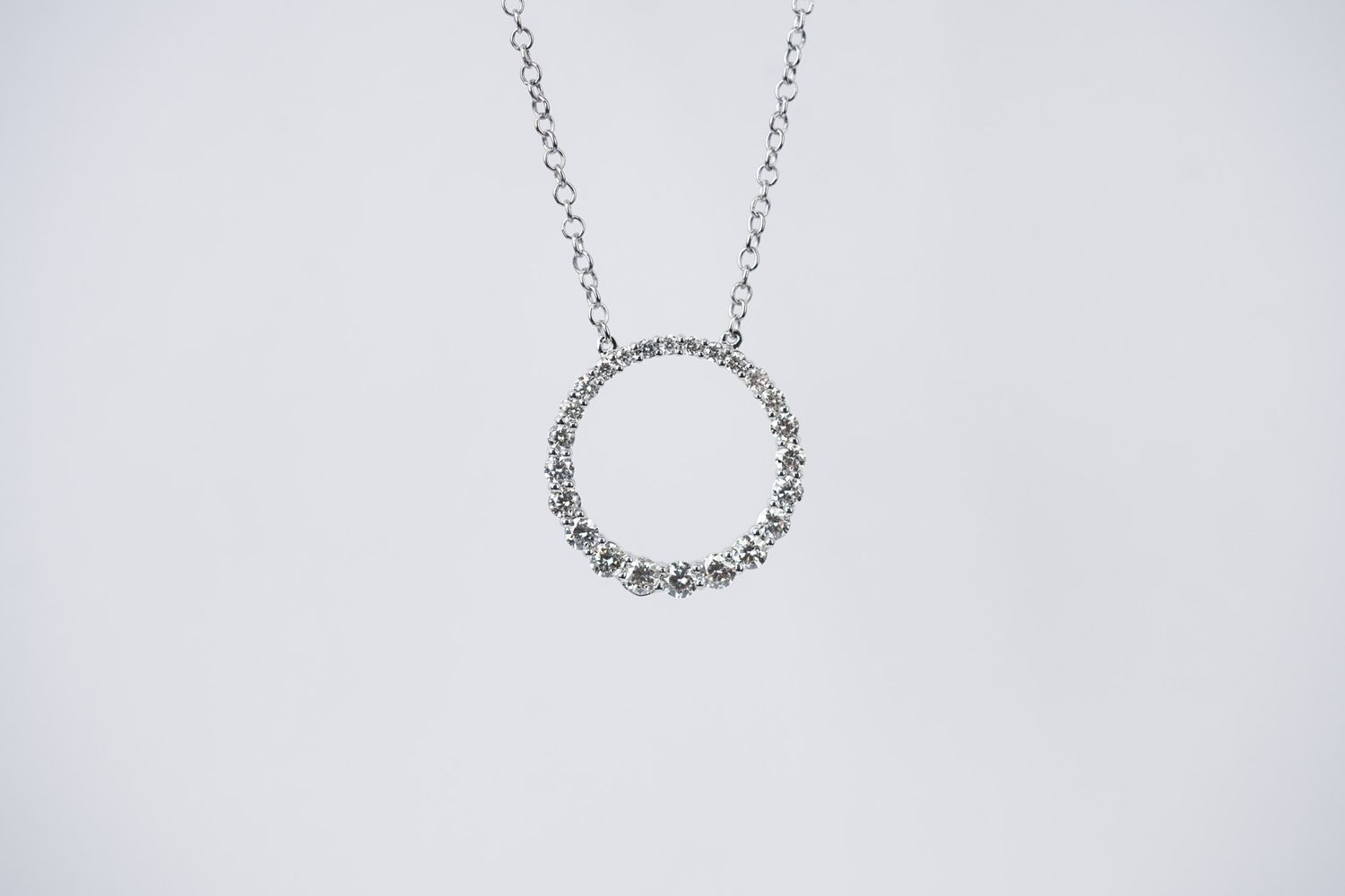EDIX- 14KW 3.33g .71ctw Graduated Diamond Circle Pendant 18&quot;