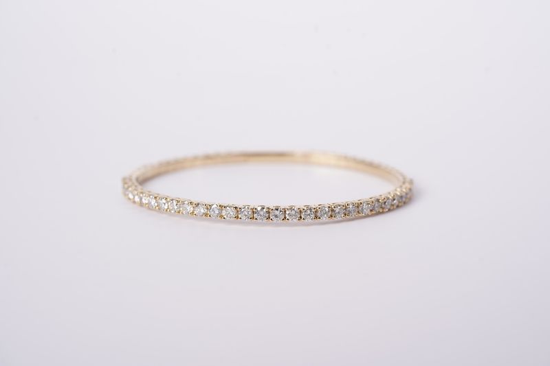 ATET- 14KY 11.92g 3.00ctw Diamond Flex Bangle 6.5&quot;
