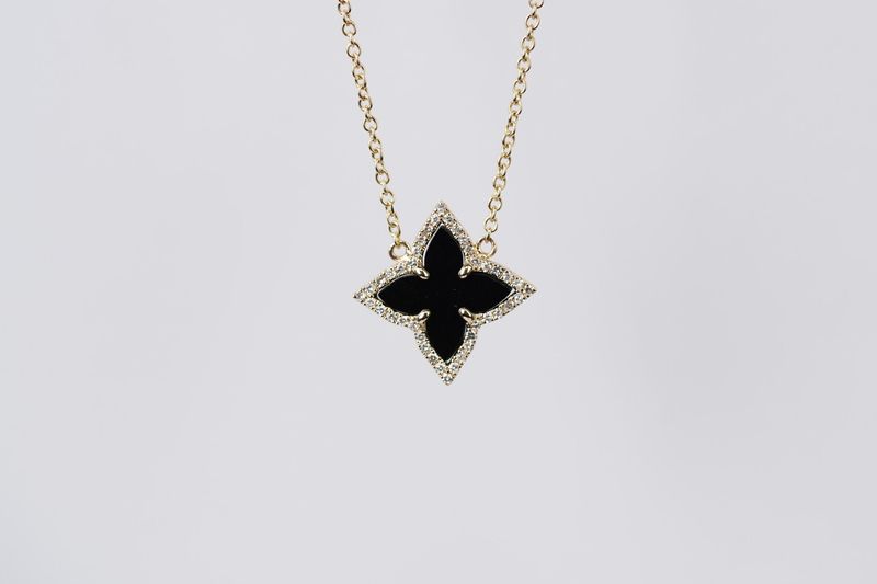 DTTX- 14KY 3.37g 1.38ctw Black Onyx &amp; Diamond Halo Fashion Pendant 16-18"