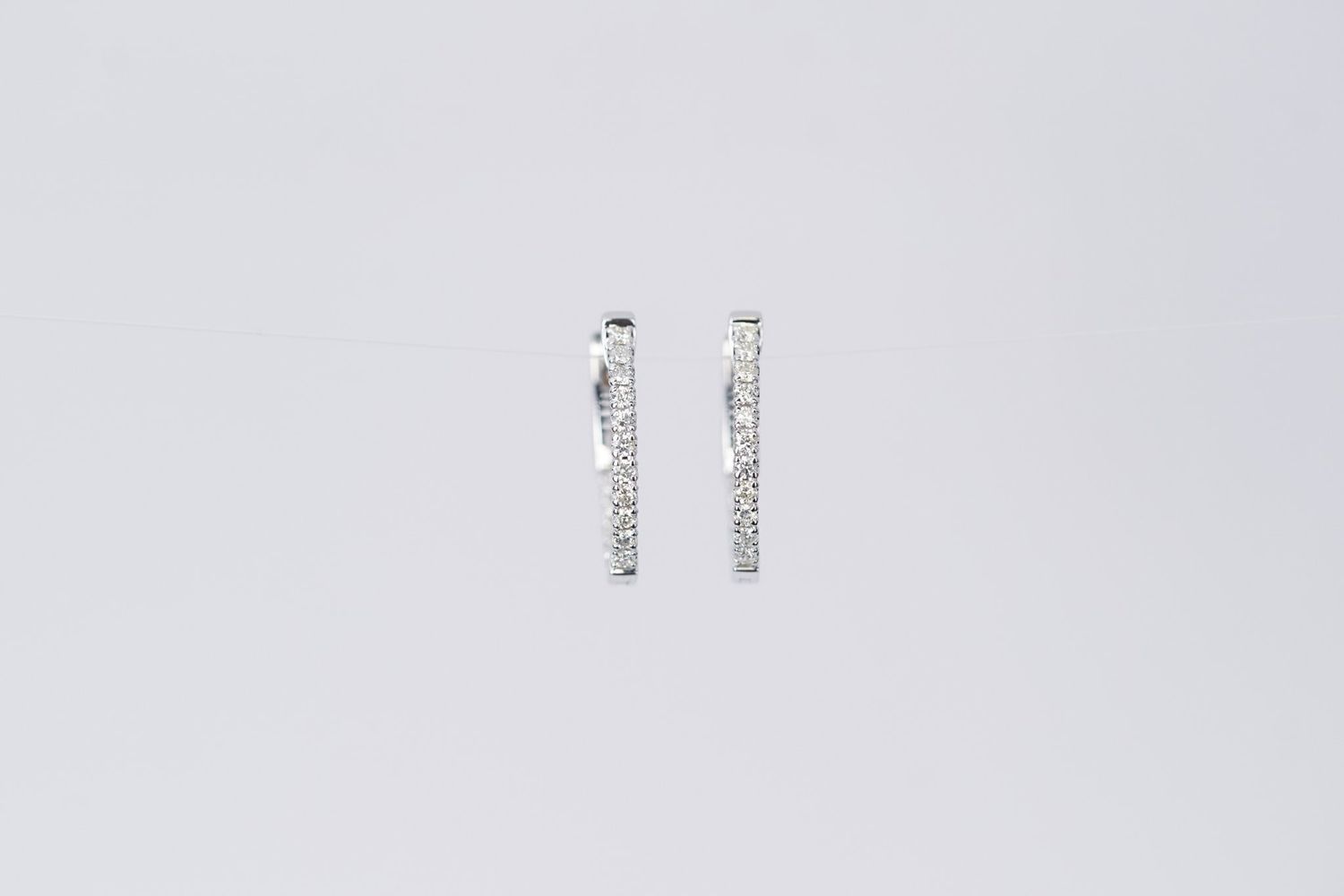 DAIX- 14KW 3.46g .52ctw Diamond Inside/Out Hoop Earrings