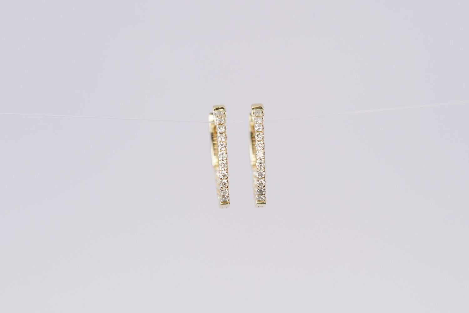 DAIX- 14KY 3.30g .52ctw Diamond Inside/Out Hoop Earrings