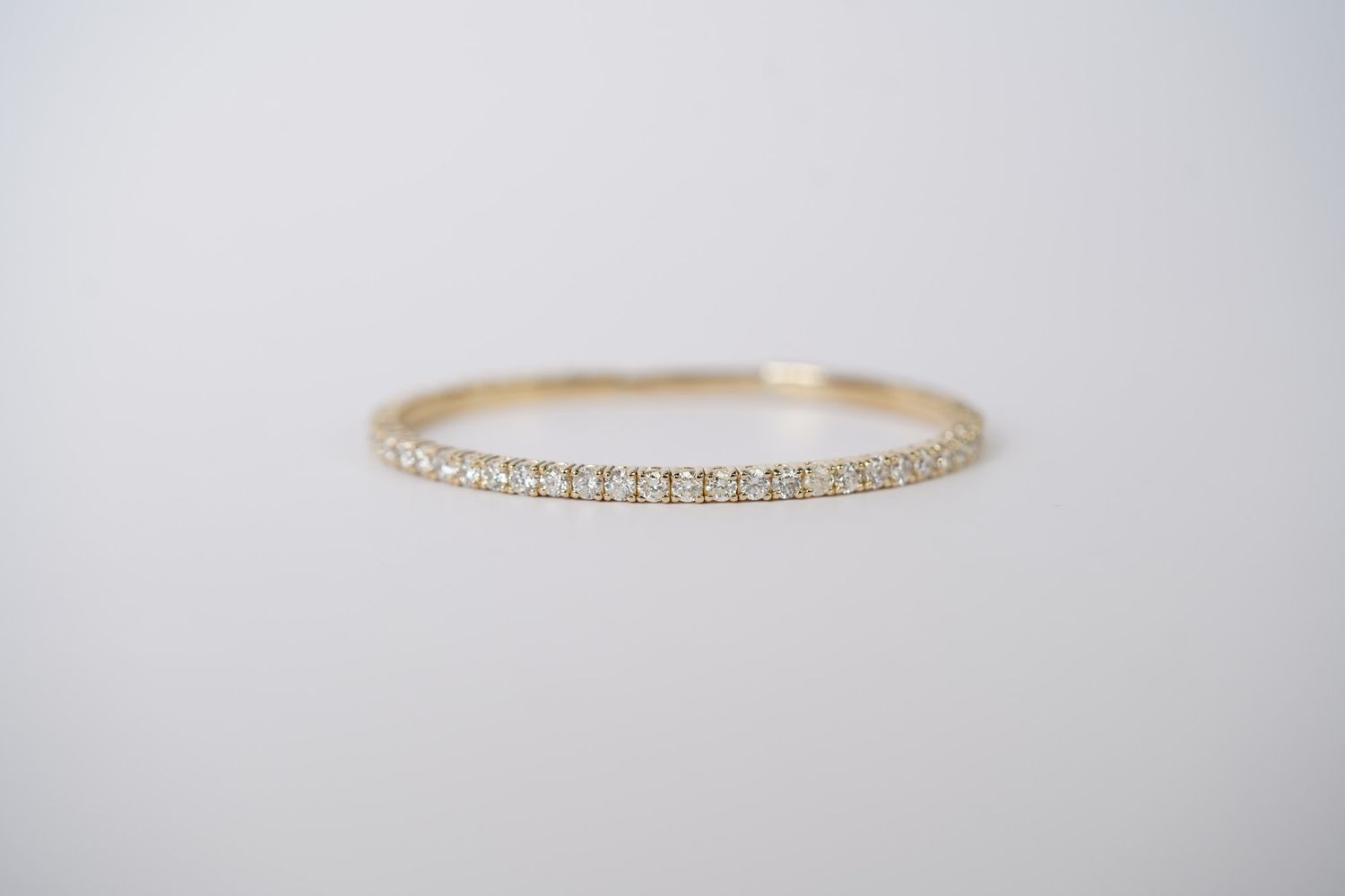 NITT- 14KY 12.50g 6.10ctw Diamond Flex Bangle