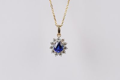 NDIX- 14KY 2.20g .90ctw (.74ctr) Sapphire &amp; Diamond Halo Pendant 16-18&quot;