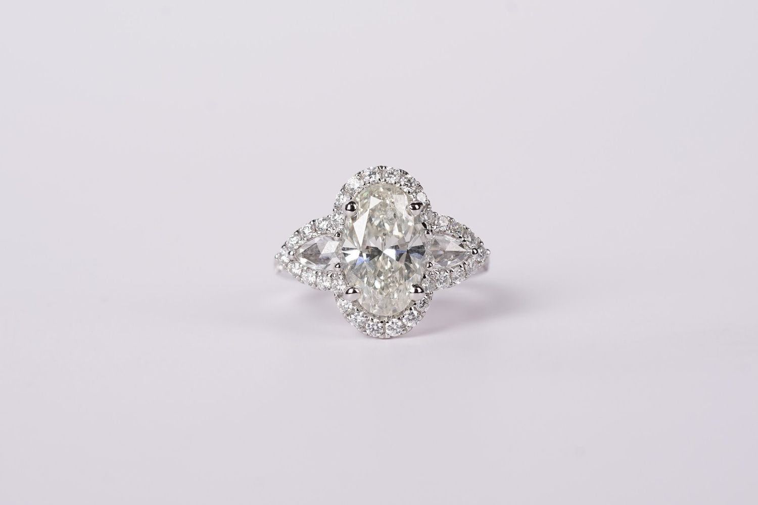 VRETT- 18KW 6.60g 4.40ctw (3.38ctr) I/SI2 Oval Diamond Halo Ring (size 6.5)