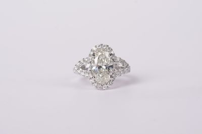 VRETT- 18KW 6.60g 4.40ctw (3.38ctr) I/SI2 Oval Diamond Halo Ring (size 6.5)