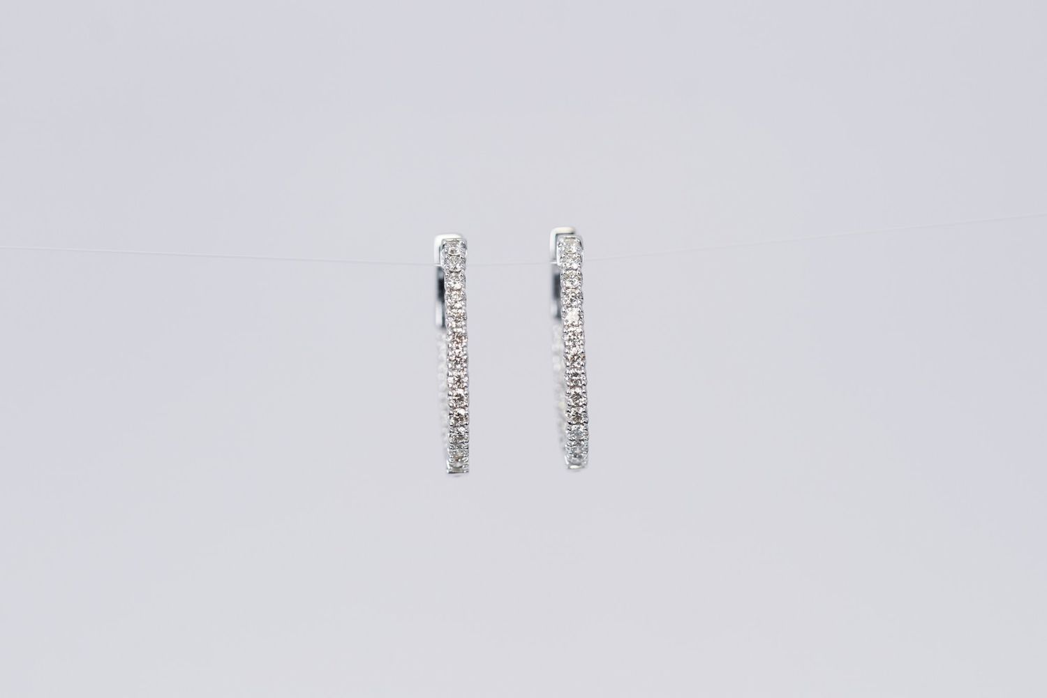 RTTX- 14KW 3.06g .70ctw Diamond Inside/Out Hoop Earrings