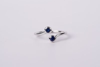 DTEX- 14KW 2.48g .39ctw Blue Sapphire Bezel Set Bypass Ring (size 7)