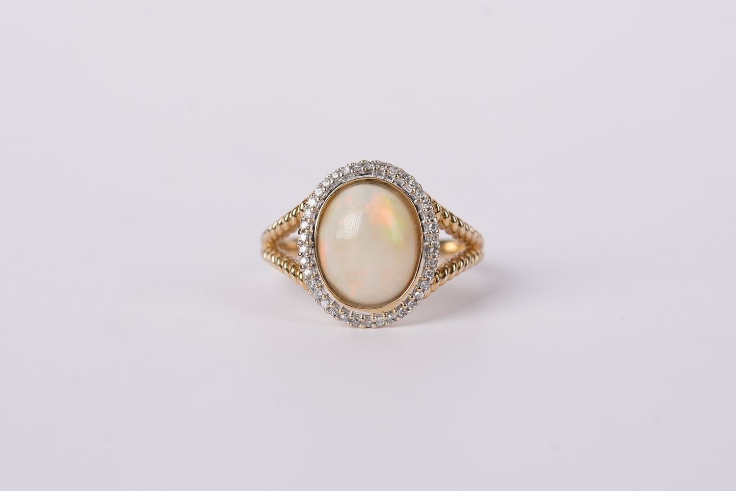 AET- 14KY 4.1g .20ctw Diamond 1.3ct Ethiopian Opal Halo Fashion Ring (size 7.25)