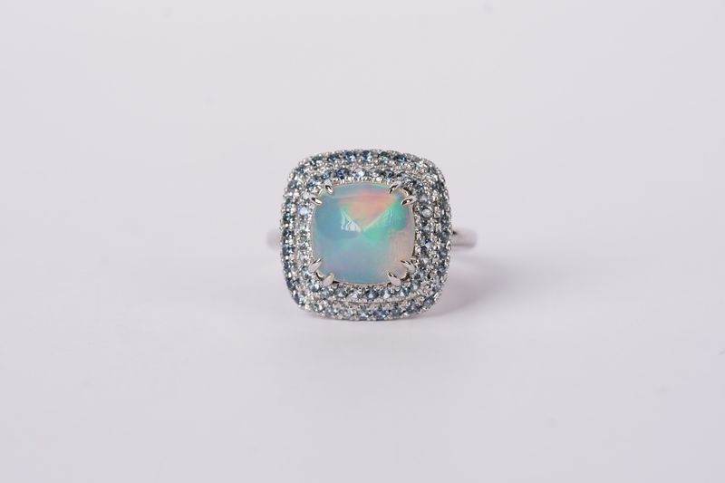RVEX- 14KW 6.84g .60ctw Sapphire 2.05ct Opal Fashion Double Halo Ring (size 7)