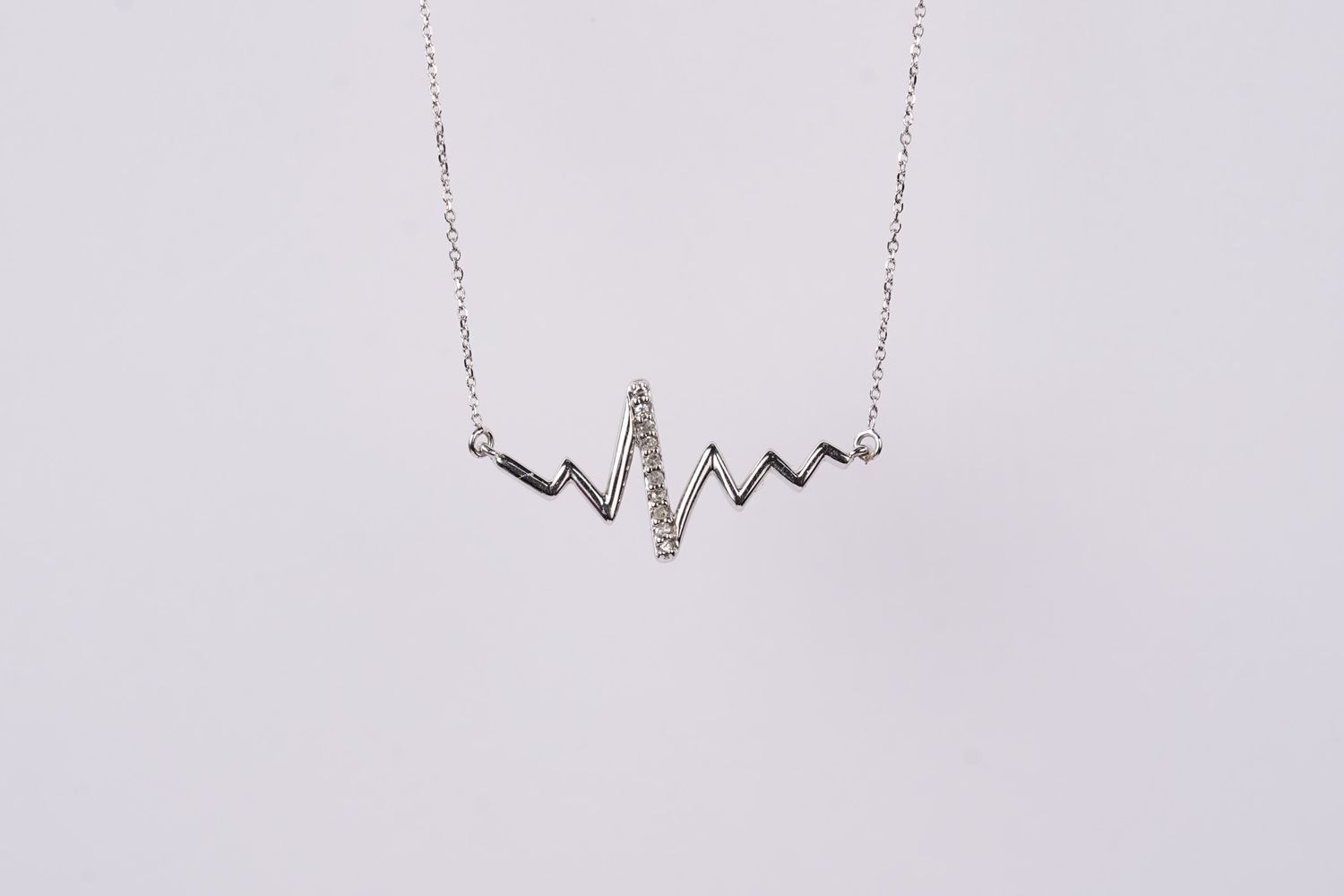VTV- 10KW 1.33g .04ctw Diamond Heartbeat Pendant 16-18&quot;