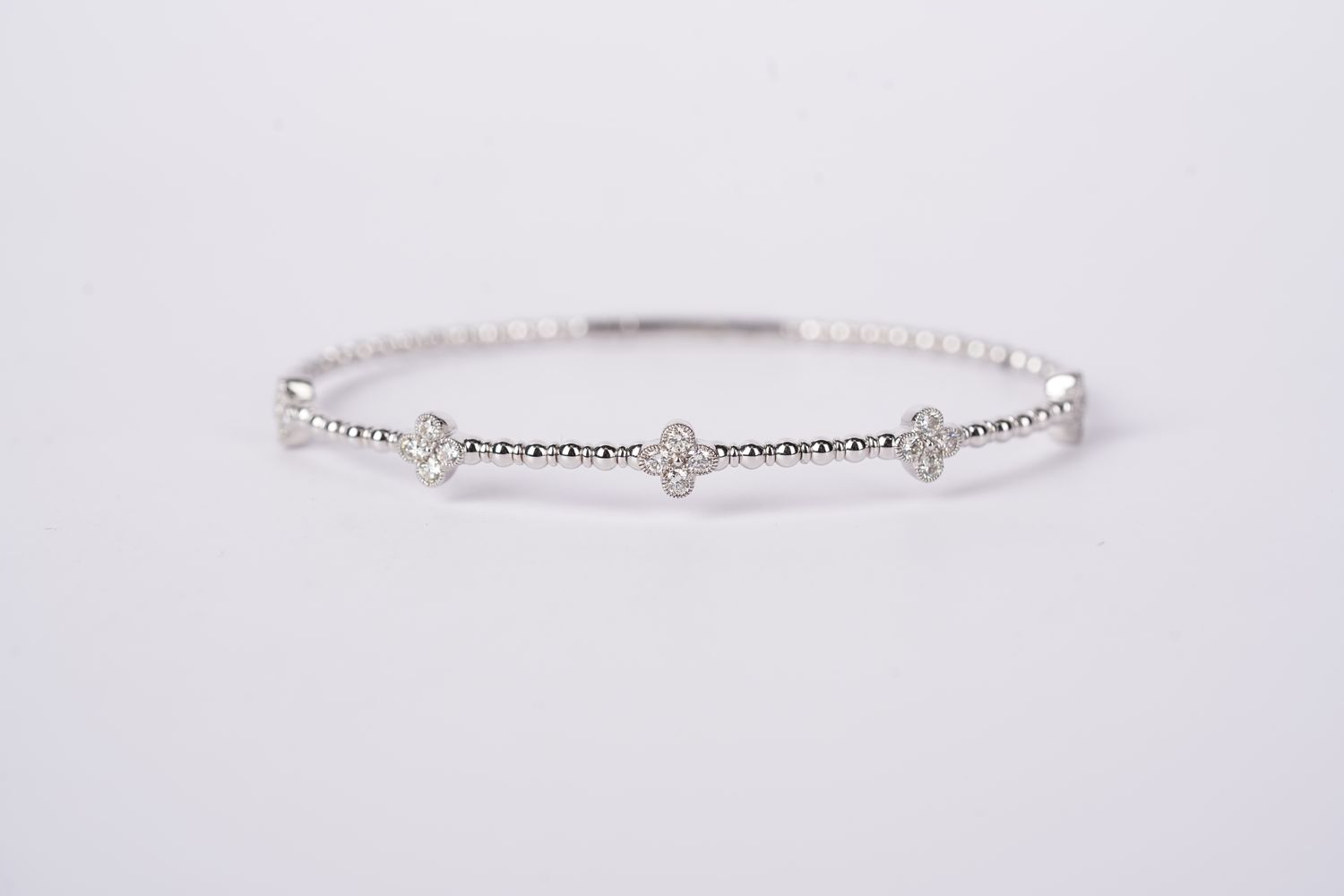 BRIX- 14KW 6.49g .66ctw Diamond Flex Bangle