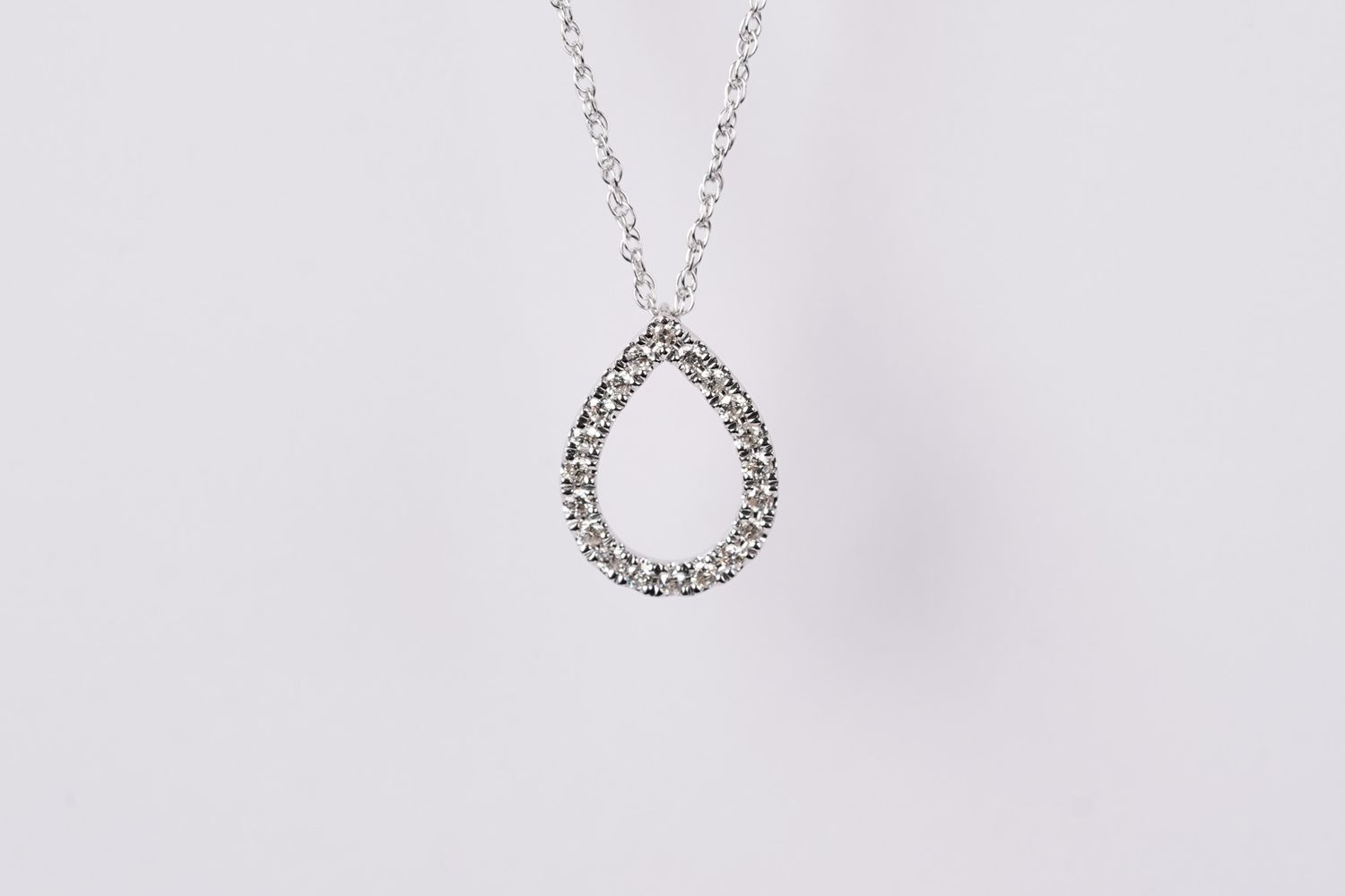 AVV- 10KW 1.41g .15ctw Diamond Pear Shape Pendant 18&quot;
