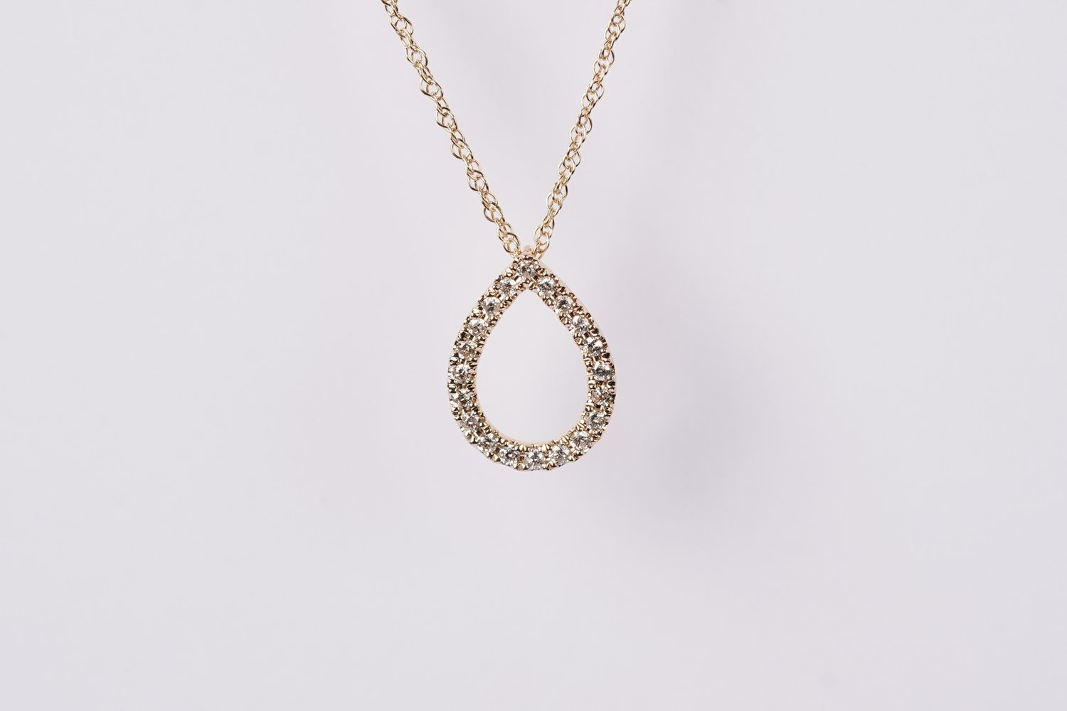 AVV- 10KY 1.41g .15ctw Diamond Pear Shape Pendant 18&quot;
