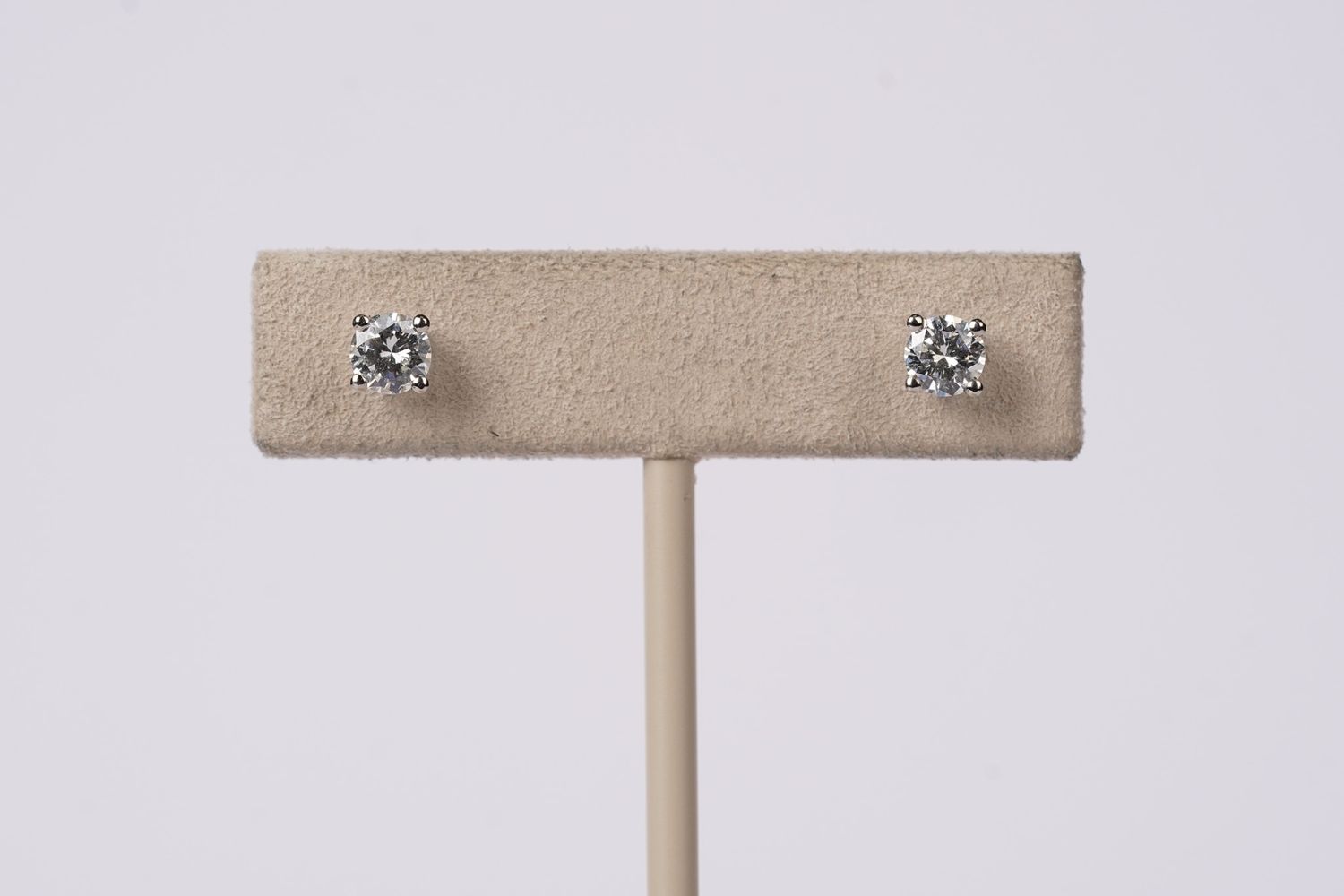 BTTX- 14KW .82g .76ctw I-J/SI1-SI2 Round Diamond Stud Earrings
