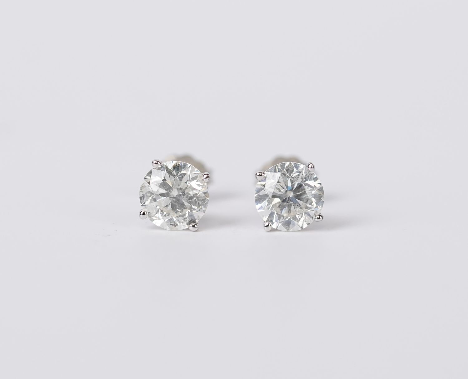 RTETX-14KW 1.55g 3.00ctw H-I/I1-I2 Round Diamond Stud Earrings