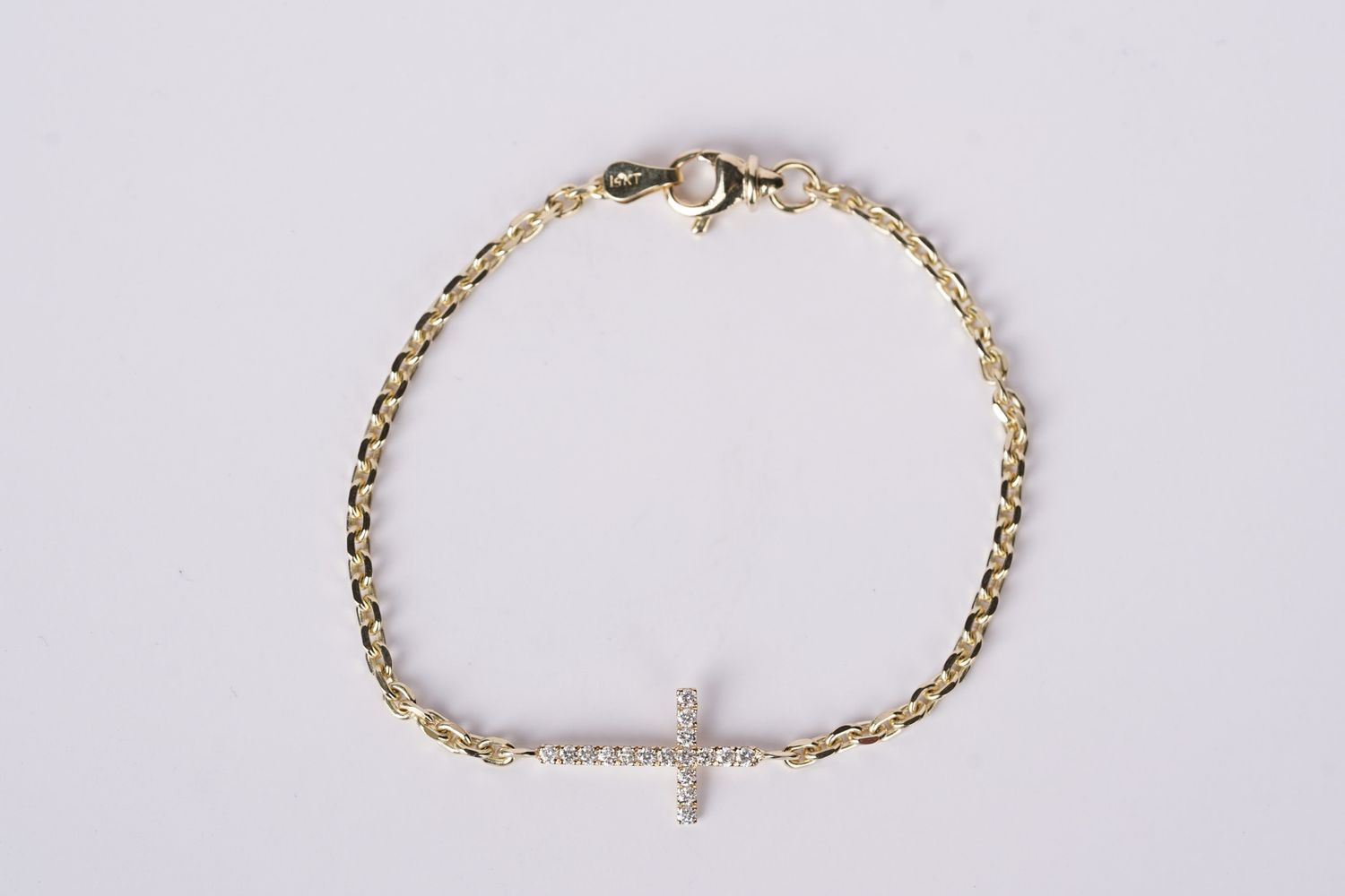 ENT- 14KY 4.73g .30ctw Diamond Cross Bracelet 7&quot;