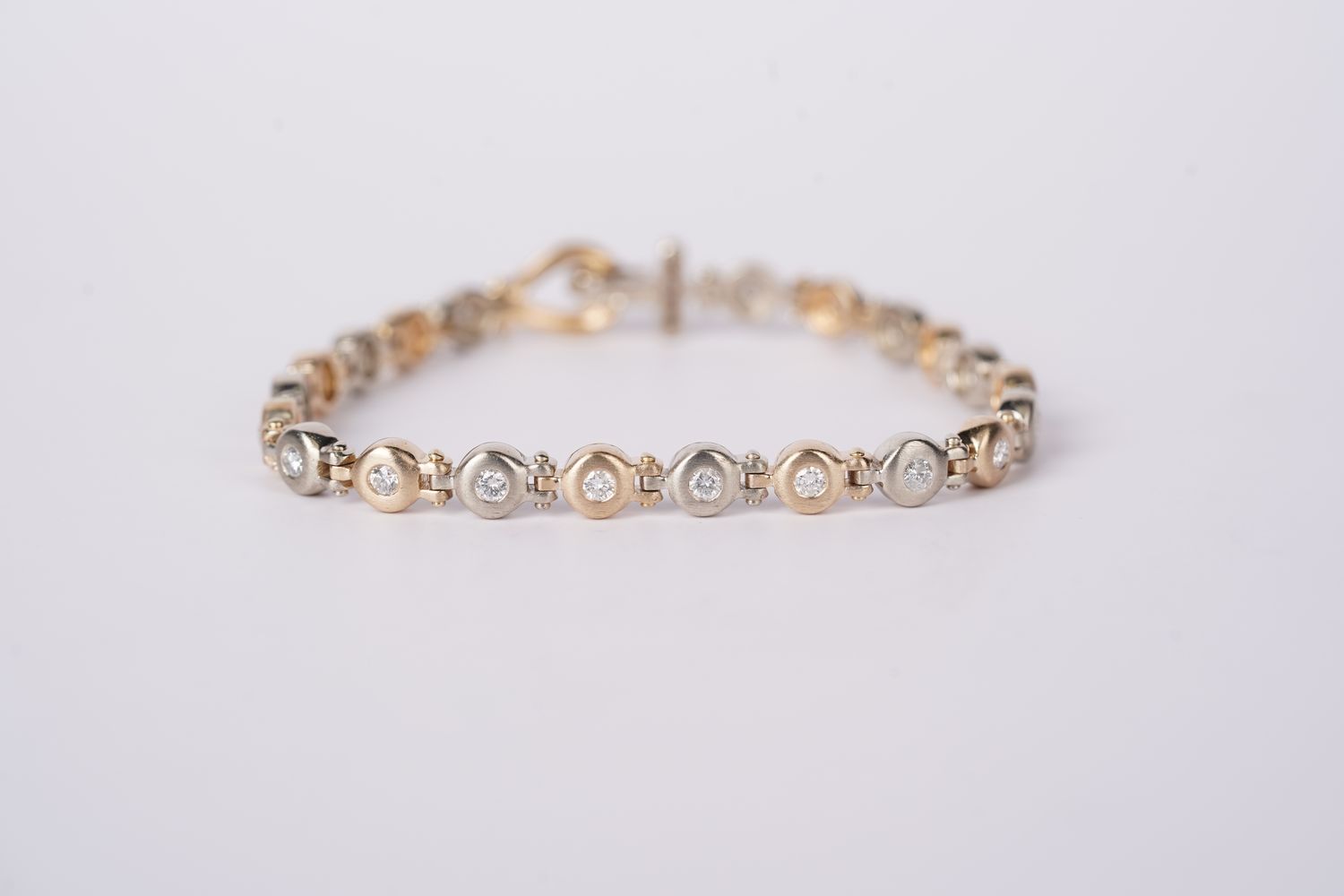 14KWY 18.01g 1.00ctw H-I/SI2-I1 Diamond Bezel Fashion Bracelet 7&quot;