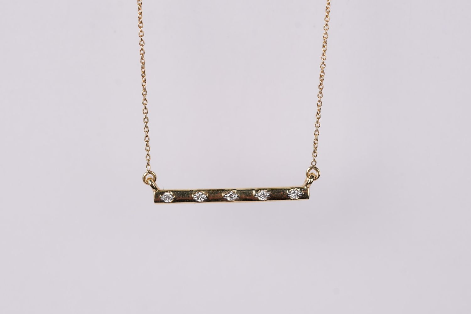 14KY 1.52g .10ctw Diamond Bar Pendant 16-18&quot;