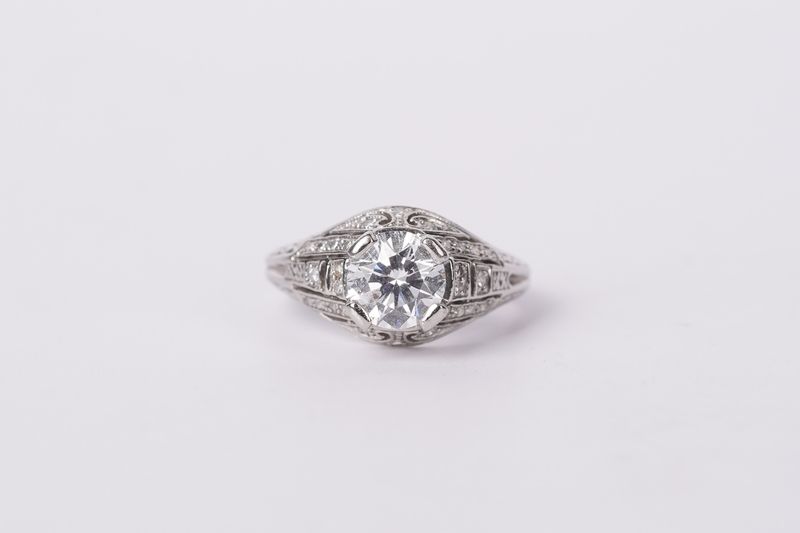 AEET- Platinum 4.73g 1.25ctw (1.10ctr) H/I1 Round Diamond Vintage Ring (size 3.75)