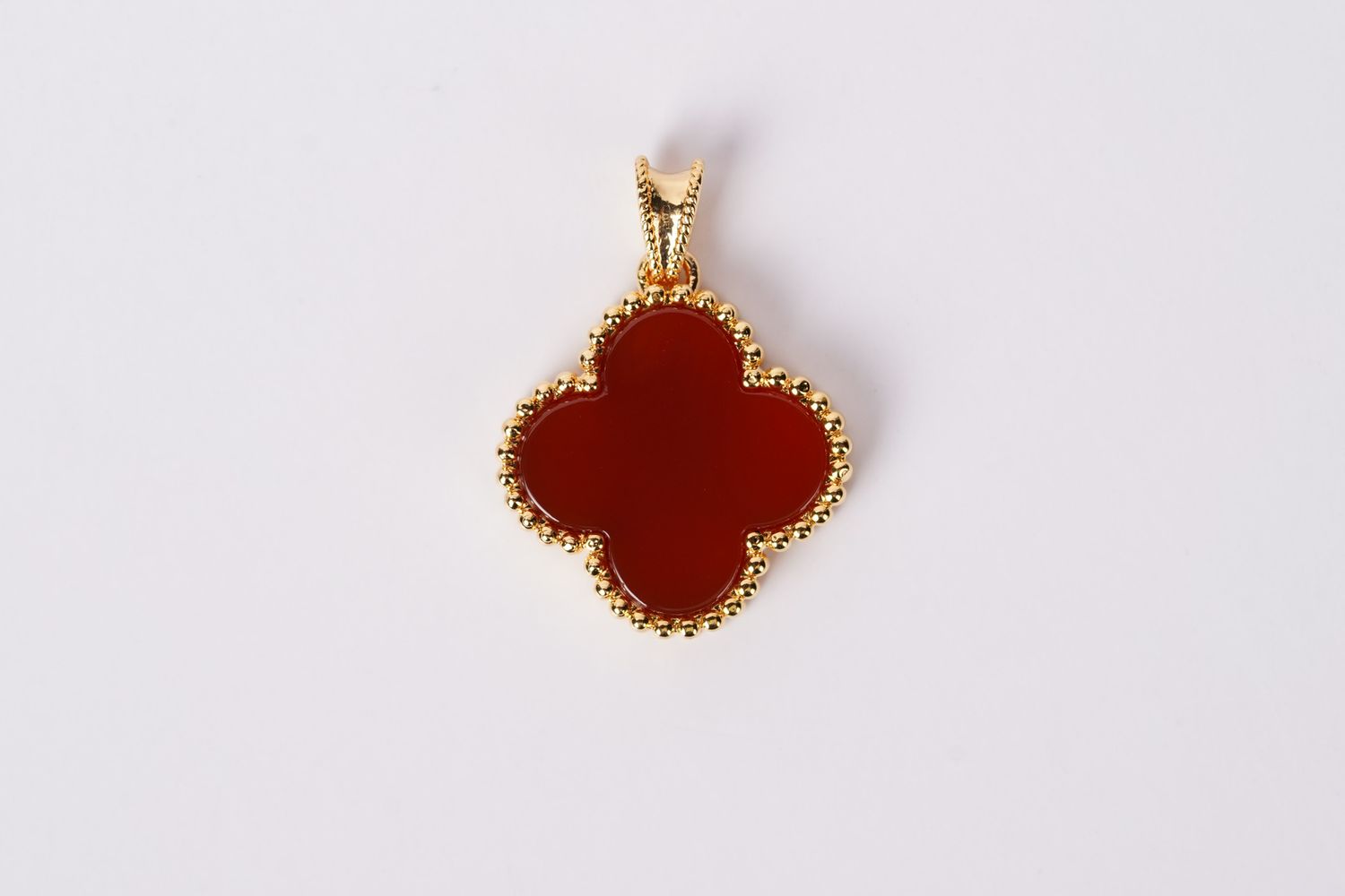 ETX- 18KY .90g Carnelian Alhambra Pendant (Pendant Only)