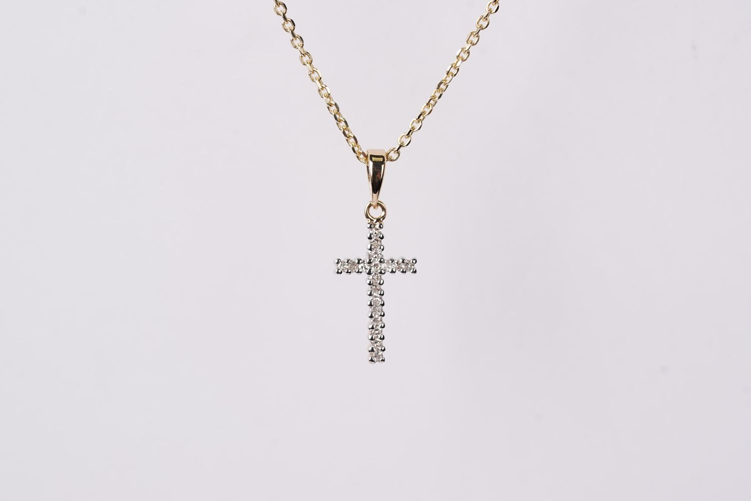 AAB- 14KY 2.24g .07ctw Petite Diamond Cross Necklace 16-18&quot;