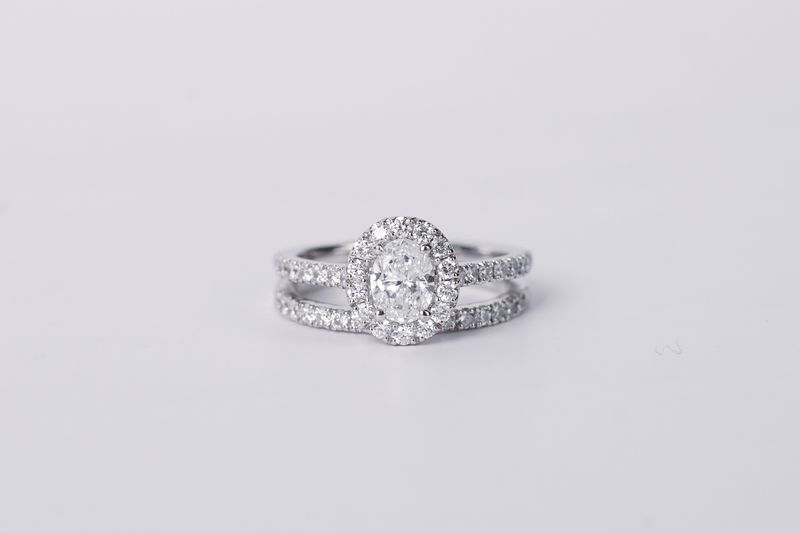 AELL-14KW 4.8g 1.68ctw (0.75ctr) I/SI2 Oval Diamond Halo Wedding Set (size 7)